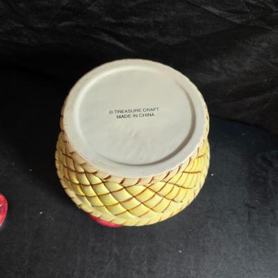 A Fruitful Display - Fruit themed lidded cookie jar - Brass wall plate - Wooden fruit bushel baskets = and a table runner with a fruit...