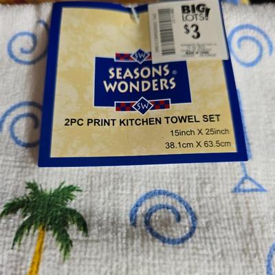 Two 9" x 13" glass Cake pans with Pyrex Portables insulated casserole carrier travel bags a tablecloth and a new flip flop...