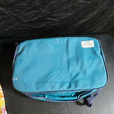 Two 9" x 13" glass Cake pans with Pyrex Portables insulated casserole carrier travel bags a tablecloth and a new flip flop...