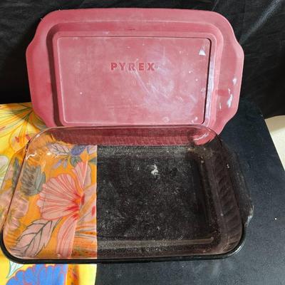 Two 9" x 13" glass Cake pans with Pyrex Portables insulated casserole carrier travel bags a tablecloth and a new flip flop...
