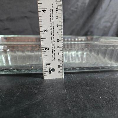 Two 9" x 13" glass Cake pans with Pyrex Portables insulated casserole carrier travel bags a tablecloth and a new flip flop...