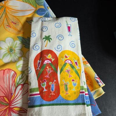 Two 9" x 13" glass Cake pans with Pyrex Portables insulated casserole carrier travel bags a tablecloth and a new flip flop...