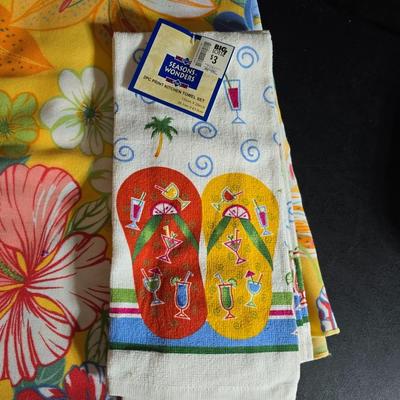 Two 9" x 13" glass Cake pans with Pyrex Portables insulated casserole carrier travel bags a tablecloth and a new flip flop...