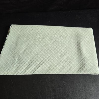 Two large serving bowls a glass cake pan, strainer and 5 square glass containers with cork stoppers