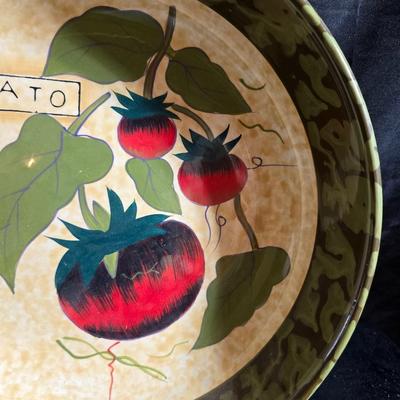 Two large serving bowls a glass cake pan, strainer and 5 square glass containers with cork stoppers