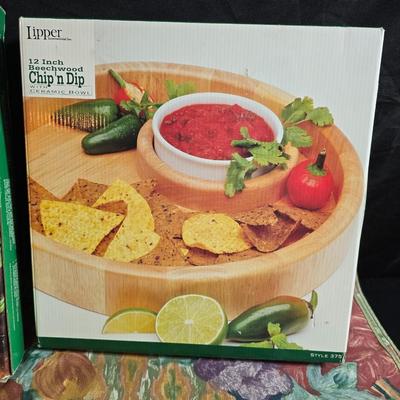 Brand new Hometrends Pizza stone with New 12" Beachwood chip n dip wither ceramic bowl and a tablecloth