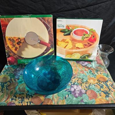 Brand new Hometrends Pizza stone with New 12" Beachwood chip n dip wither ceramic bowl and a tablecloth