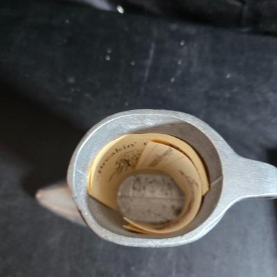 Western themed barbed wire cactus with barbed wire boot and star and a Wilton Armetale pewter cowboy boot pitcher.