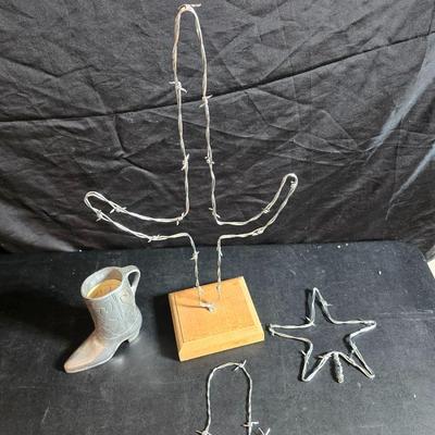 Western themed barbed wire cactus with barbed wire boot and star and a Wilton Armetale pewter cowboy boot pitcher.