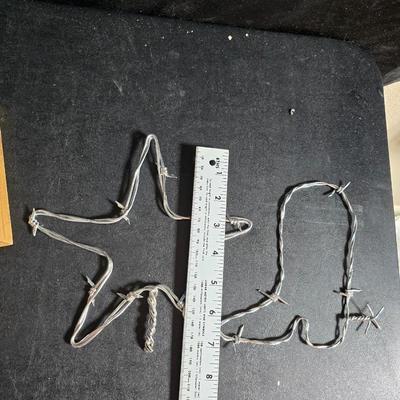 Western themed barbed wire cactus with barbed wire boot and star and a Wilton Armetale pewter cowboy boot pitcher.