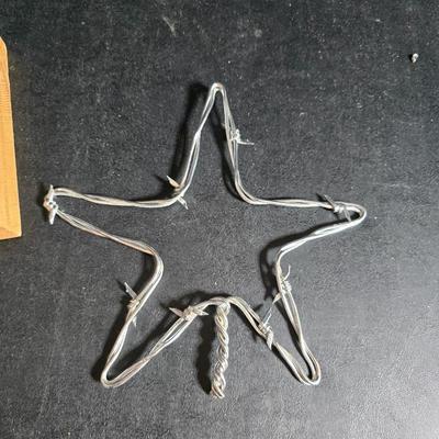 Western themed barbed wire cactus with barbed wire boot and star and a Wilton Armetale pewter cowboy boot pitcher.