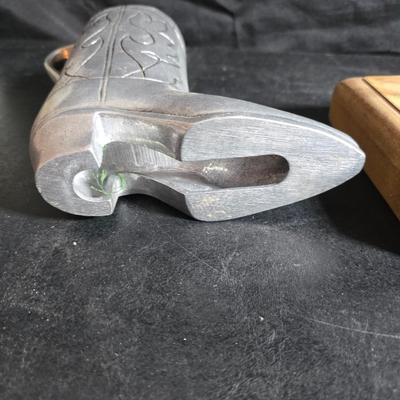 Western themed barbed wire cactus with barbed wire boot and star and a Wilton Armetale pewter cowboy boot pitcher.