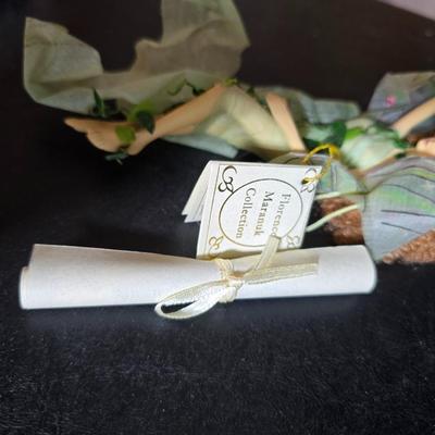 Two metal floral wall buckets with a Fairy, a suncatcher and a thermometer