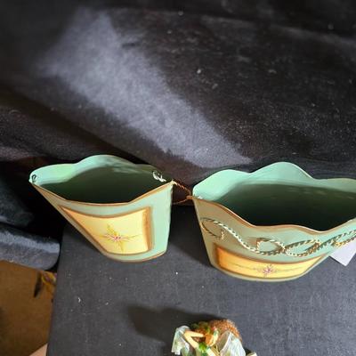 Two metal floral wall buckets with a Fairy, a suncatcher and a thermometer