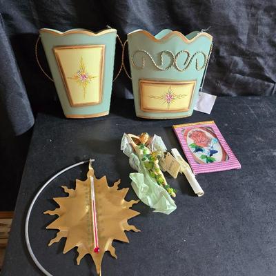Two metal floral wall buckets with a Fairy, a suncatcher and a thermometer