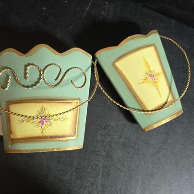 Two metal floral wall buckets with a Fairy, a suncatcher and a thermometer