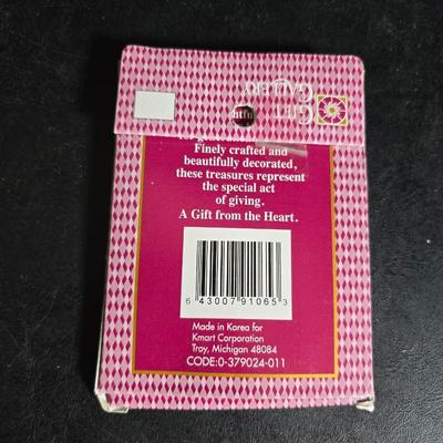 Two metal floral wall buckets with a Fairy, a suncatcher and a thermometer