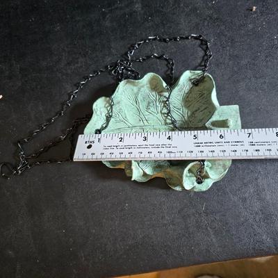 Bird house, small hanging leaf bird feeder/bath, large tin lizard and a glass flower vase