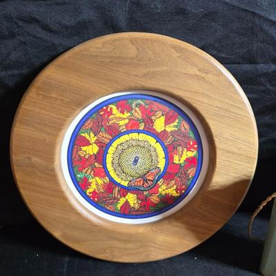 Two matching floral wall buckets, Butterflies, Sun dial clock, a small ceramic garden worm, and a decorative wall hanging