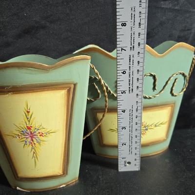 Two matching floral wall buckets, Butterflies, Sun dial clock, a small ceramic garden worm, and a decorative wall hanging