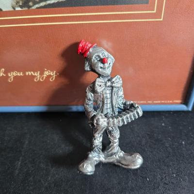 Framed Clown wall art - 1979 Hallmark cards Inc. PTR250 With George Good Corporation pewter clown figurine playing an accordion.