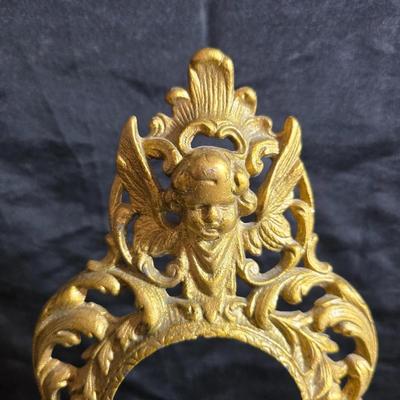 Antique cast metal gold guild clock face frame with Saja China dish - four small, vintage ceramic cups with leaf like handles and a small...