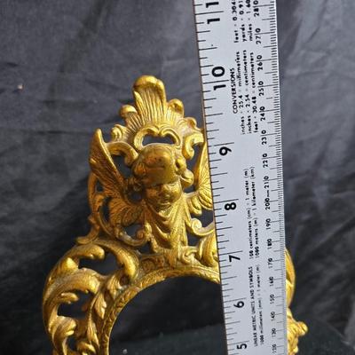 Antique cast metal gold guild clock face frame with Saja China dish - four small, vintage ceramic cups with leaf like handles and a small...