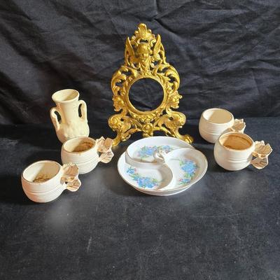 Antique cast metal gold guild clock face frame with Saja China dish - four small, vintage ceramic cups with leaf like handles and a small...