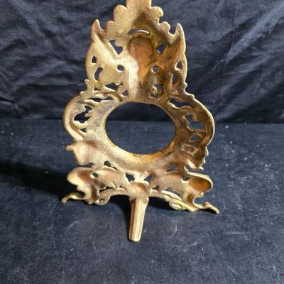 Antique cast metal gold guild clock face frame with Saja China dish - four small, vintage ceramic cups with leaf like handles and a small...