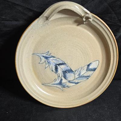Vintage studio pottery bowl and pie plate / platter with feathers on it