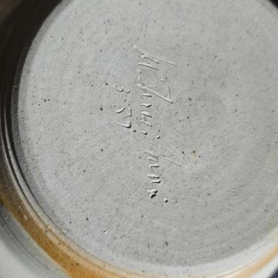 Vintage studio pottery bowl and pie plate / platter with feathers on it