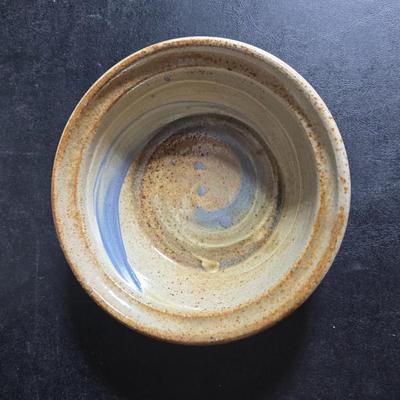 Vintage studio pottery bowl and pie plate / platter with feathers on it