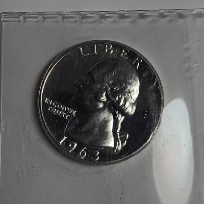TWO 1963 UNC SILVER QUARTERS