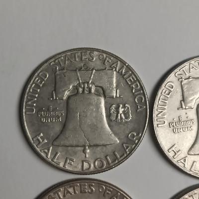 FOUR FRANKLIN SILVER HALF DOLLARS
