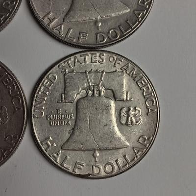 FOUR FRANKLIN SILVER HALF DOLLARS