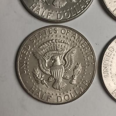 FOUR 1964 KENNEDY SILVER HALF DOLLARS