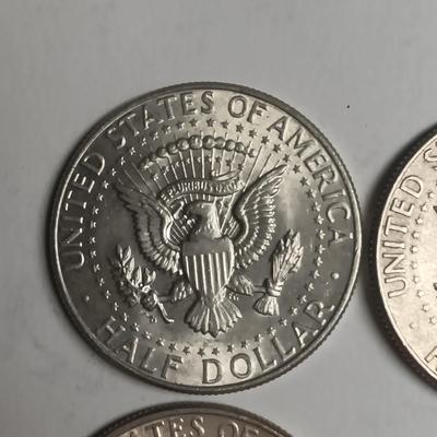 FOUR 1964 KENNEDY SILVER HALF DOLLARS