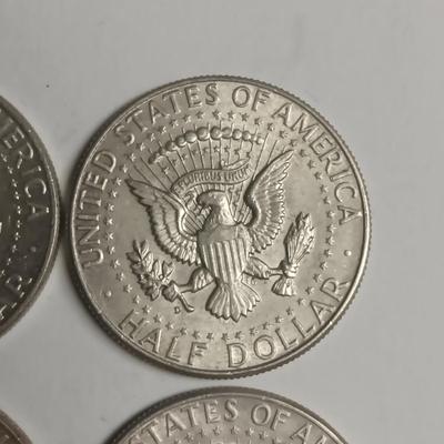 FOUR 1964 KENNEDY SILVER HALF DOLLARS