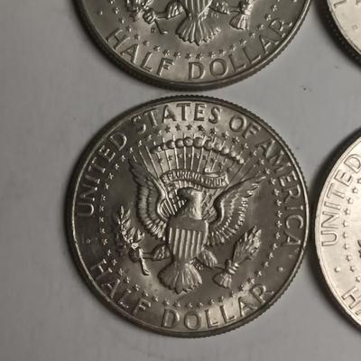 FOUR 1964 KENNEDY SILVER HALF DOLLARS