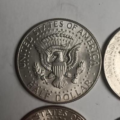 FOUR 1964 KENNEDY SILVER HALF DOLLARS