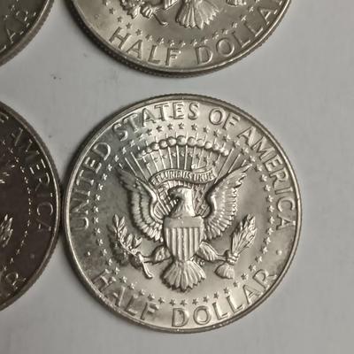 FOUR 1964 KENNEDY SILVER HALF DOLLARS