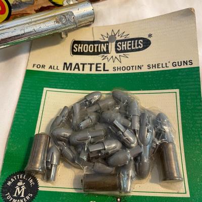 MATTEL FANNER SHOOTIN SHELLS TOY GUN, SEALED SHOOTIN SHELLS AND A VINTAGE TARGET