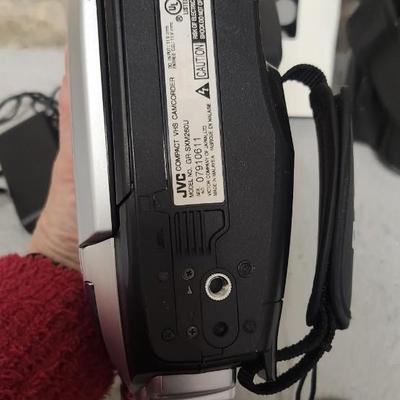 Sale Photo Thumbnail #692: JVC Super VHS video camera with a couple tapes, a converter, battery, charger cord and case. Fits large flat rate box