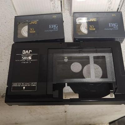 Sale Photo Thumbnail #693: JVC Super VHS video camera with a couple tapes, a converter, battery, charger cord and case. Fits large flat rate box