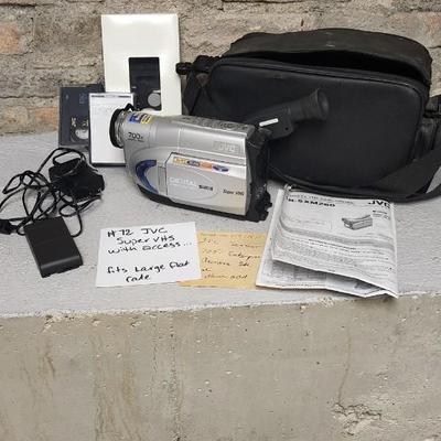 Sale Photo Thumbnail #686: JVC Super VHS video camera with a couple tapes, a converter, battery, charger cord and case. Fits large flat rate box