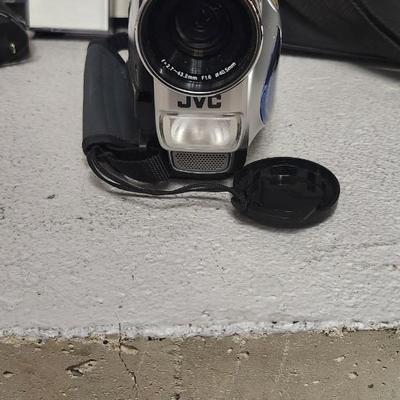 Sale Photo Thumbnail #690: JVC Super VHS video camera with a couple tapes, a converter, battery, charger cord and case. Fits large flat rate box