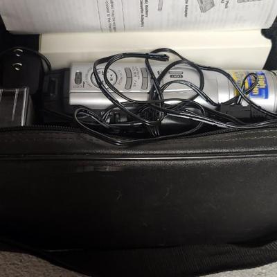 Sale Photo Thumbnail #697: JVC Super VHS video camera with a couple tapes, a converter, battery, charger cord and case. Fits large flat rate box