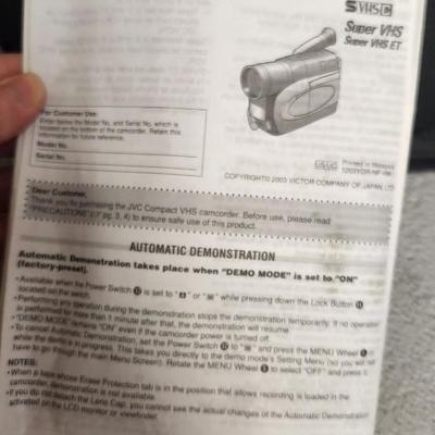 Sale Photo Thumbnail #696: JVC Super VHS video camera with a couple tapes, a converter, battery, charger cord and case. Fits large flat rate box