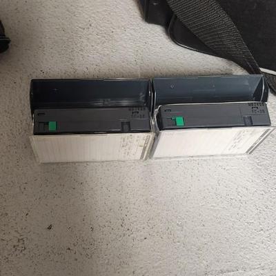 Sale Photo Thumbnail #694: JVC Super VHS video camera with a couple tapes, a converter, battery, charger cord and case. Fits large flat rate box