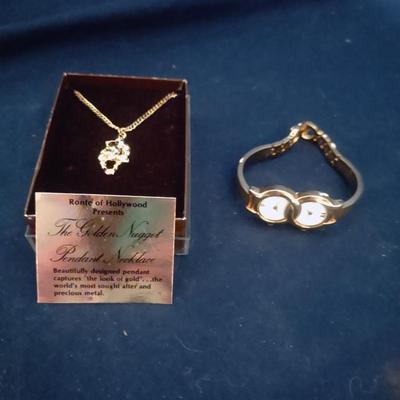 BULOVA DUEL TIME ZONE WATCH AND THE GOLDEN NUGGET PENDANT NECKLACE
